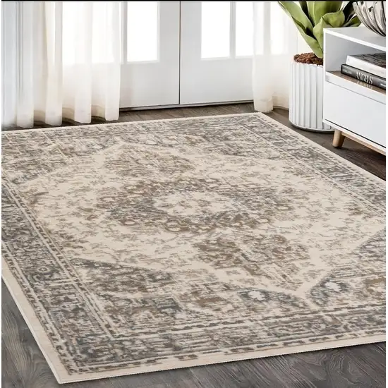 5' X 7' Beige Medallion Power Loom Area Rug Photo 1