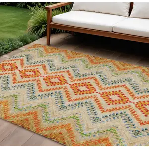 Photo of Beige Orange And Red Geometric Washable Indoor Outdoor Area Rug