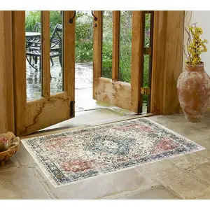 Photo of Beige Oriental Distressed Area Rug With Fringe