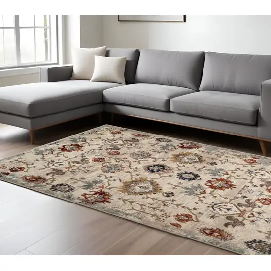 Beige Rust and Navy Oriental Power Loom Area Rug Photo 1