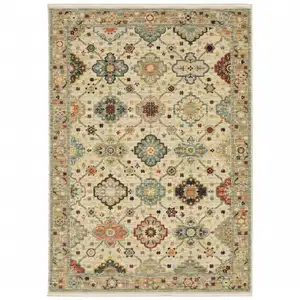 Photo of Beige Pale Blue Rust Gold Tan Brown And Orange Oriental Power Loom Stain Resistant Area Rug With Fringe