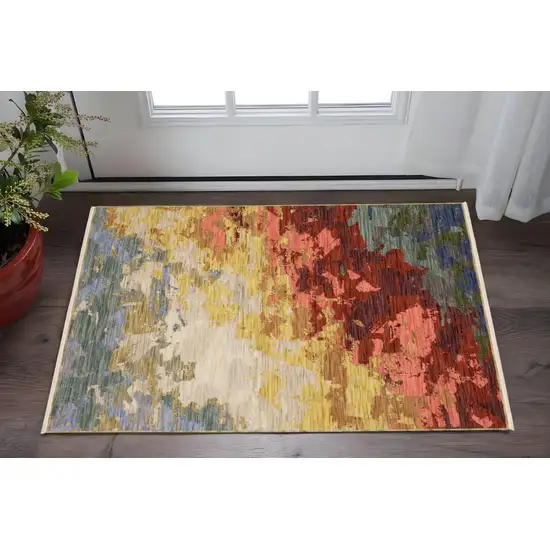 Beige Red And Yellow Abstract Area Rug With Fringe Photo 1