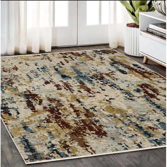 Beige Rust And Light Blue Abstract Distressed Area Rug With Fringe Photo 1