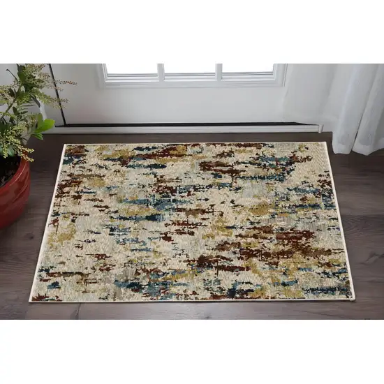 Beige Rust And Tan Abstract Area Rug With Fringe Photo 1