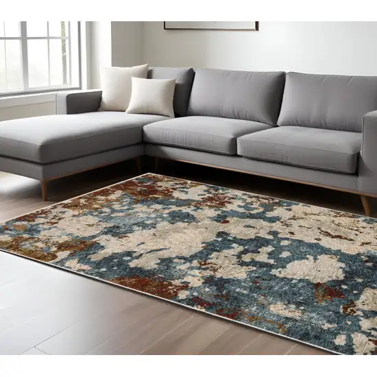 Beige Rust And Teal Abstract Distressed Area Rug With Fringe Photo 1