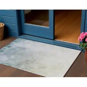 Photo of Beige Sky Blue And Teal Blue Ombre Washable Indoor Outdoor Area Rug