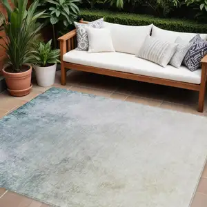 Photo of Beige Sky Blue And Teal Blue Ombre Washable Indoor Outdoor Area Rug