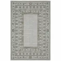 Photo of Beige Stain Resistant Indoor Outdoor Area Rug