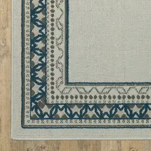 Photo of Beige Stain Resistant Indoor Outdoor Area Rug