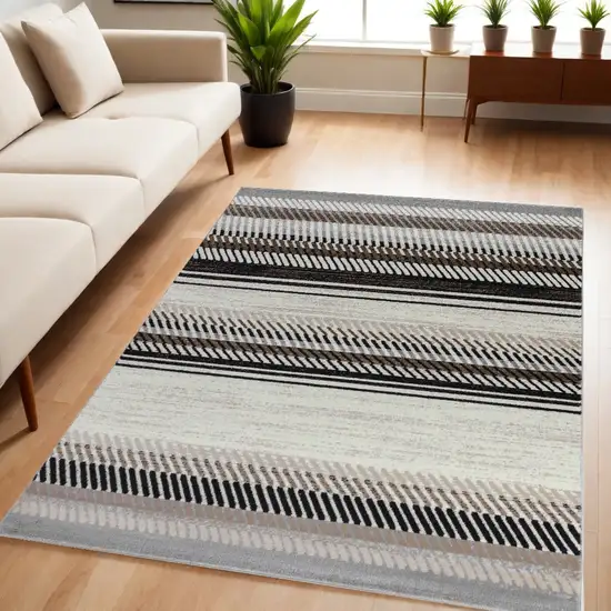 5' X 8' Beige Striped Area Rug Photo 1