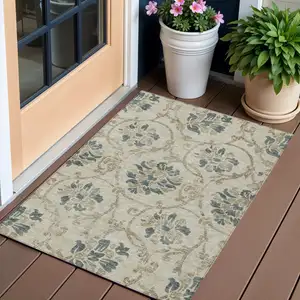 Photo of Beige Tan And Blue Floral Washable Indoor Outdoor Area Rug