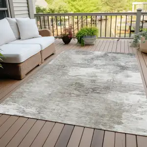 Photo of Beige Tan And Gray Abstract Washable Indoor Outdoor Area Rug