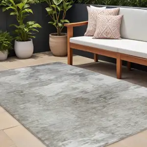 Photo of Beige Tan And Gray Abstract Washable Indoor Outdoor Area Rug