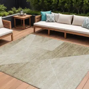 Photo of Beige Tan And Ivory Abstract Washable Indoor Outdoor Area Rug