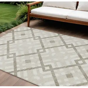 Photo of Beige Tan And Ivory Geometric Washable Indoor Outdoor Area Rug