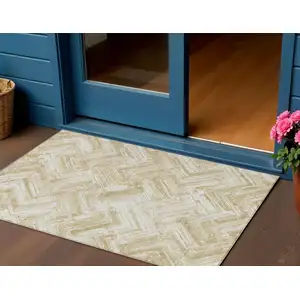 Photo of Beige Tan And Ivory Geometric Washable Indoor Outdoor Area Rug