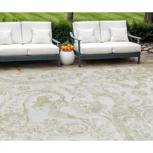 Photo of Beige Tan And Ivory Paisley Washable Indoor Outdoor Area Rug