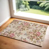 Photo of Beige Tan And Red Floral Non Skid Area Rug