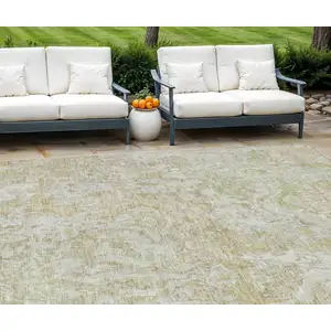 Photo of Beige Tan And Taupe Abstract Washable Indoor Outdoor Area Rug