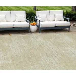 Photo of Beige Tan And Taupe Abstract Washable Indoor Outdoor Area Rug