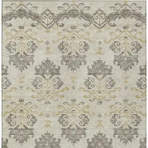 Photo of Beige Tan And Taupe Oriental Washable Indoor Outdoor Area Rug