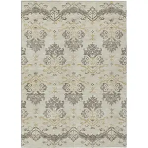 Photo of Beige Tan And Taupe Oriental Washable Indoor Outdoor Area Rug