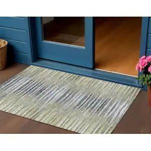 Photo of Beige Tan And Taupe Striped Washable Indoor Outdoor Area Rug