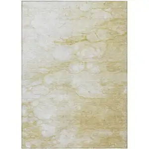 Photo of Beige Taupe And Artichoke Green Abstract Washable Indoor Outdoor Area Rug