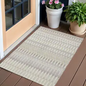 Photo of Beige Taupe And Gold Southwestern Washable Indoor Outdoor Area Rug