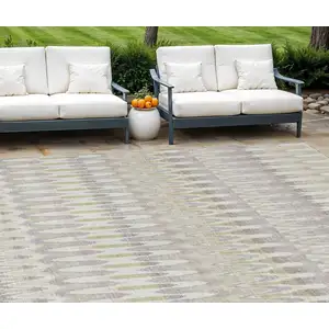 Photo of Beige Taupe And Gold Southwestern Washable Indoor Outdoor Area Rug