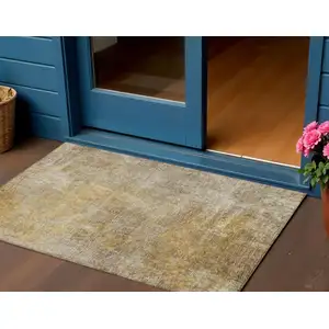 Photo of Beige Taupe And Ivory Abstract Washable Indoor Outdoor Area Rug