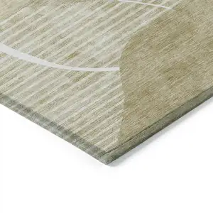 Photo of Beige Taupe And Tan Abstract Washable Indoor Outdoor Area Rug