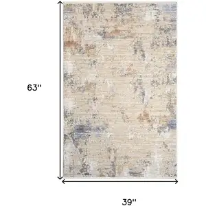 Photo of Beige Teal Blue and Gray Abstract Area Rug With Fringe