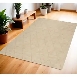 Photo of Beige Wool Geometric Area Rug