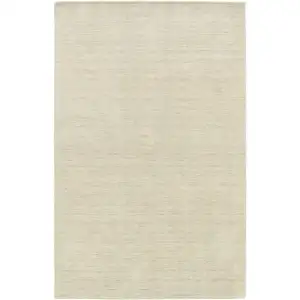 Photo of Beige Wool Hand Tufted Area Rug