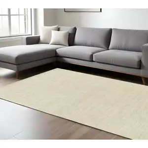 Photo of Beige Wool Hand Tufted Area Rug