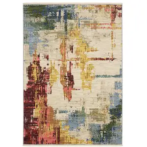 Photo of Beige Yellow And Rust Abstract Area Rug With Fringe