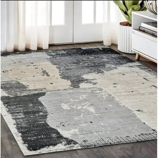 Beige and Black Abstract Distressed Area Rug Photo 1