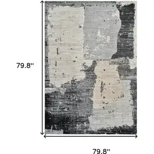 Photo of Beige and Black Abstract Distressed Area Rug