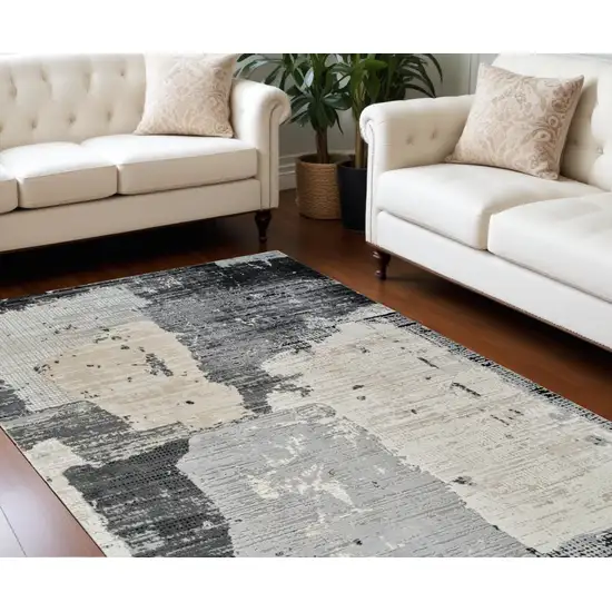 Beige and Black Abstract Distressed Area Rug Photo 1