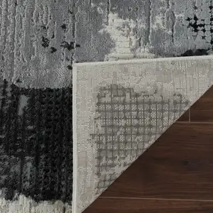 Photo of Beige and Black Abstract Distressed Area Rug