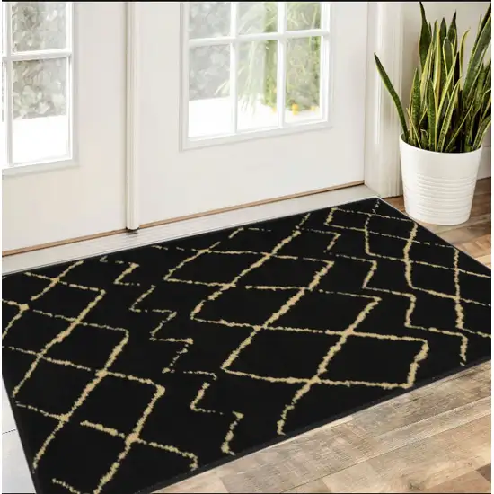 Beige And Black Floral Distressed Area Rug Photo 1