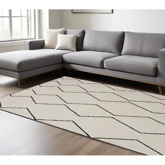 Beige and Black Geometric Power Loom Distressed Area Rug Photo 1