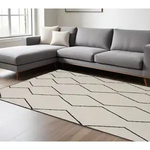 Photo of Beige and Black Geometric Power Loom Distressed Area Rug