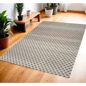 Photo of Beige and Black Geometric Power Loom Washable Non Skid Area Rug