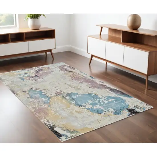 Beige and Blue Abstract Distressed Area Rug Photo 1