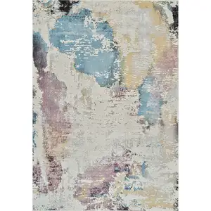 Photo of Beige and Blue Abstract Distressed Area Rug