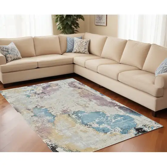 Beige and Blue Abstract Distressed Area Rug Photo 1