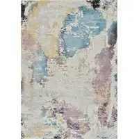 Photo of Beige and Blue Abstract Distressed Area Rug