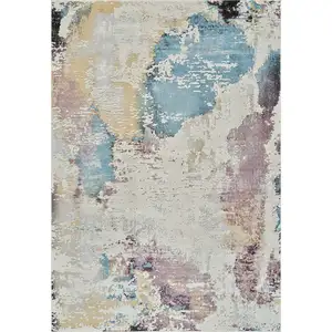 Photo of Beige and Blue Abstract Distressed Area Rug